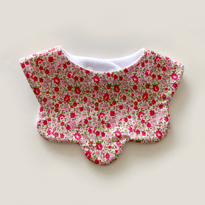 Pink with green ditsy floral scallop bib