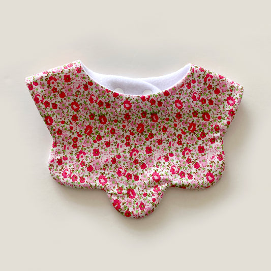 Pink with green ditsy floral scallop bib