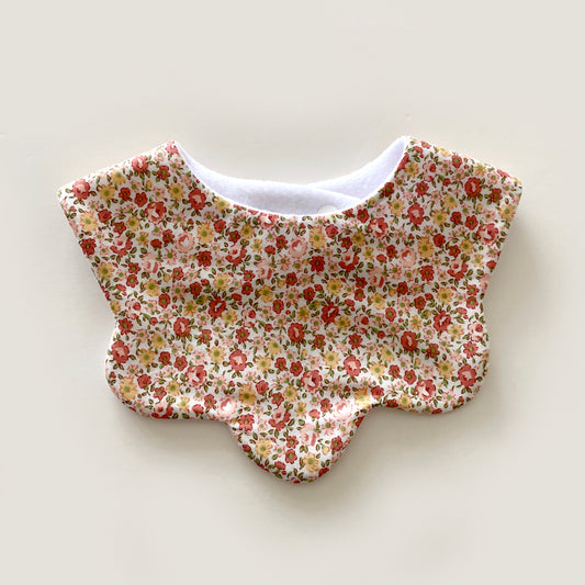 Rust and mustard ditsy floral scallop bib