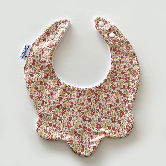 Rust and mustard ditsy floral scallop bib