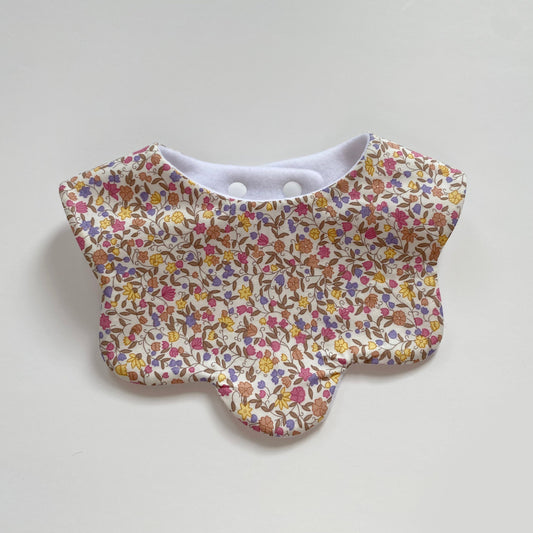 Pastel ditsy scallop bib