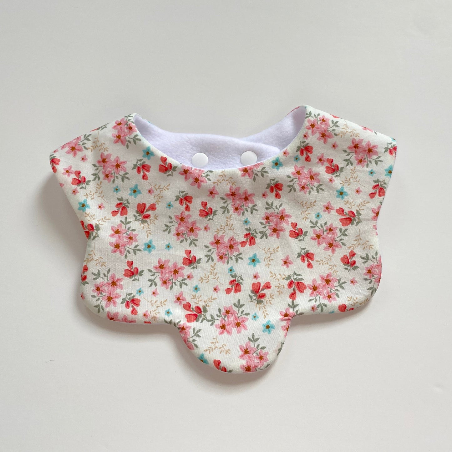 White with red pink flowers scallop bib