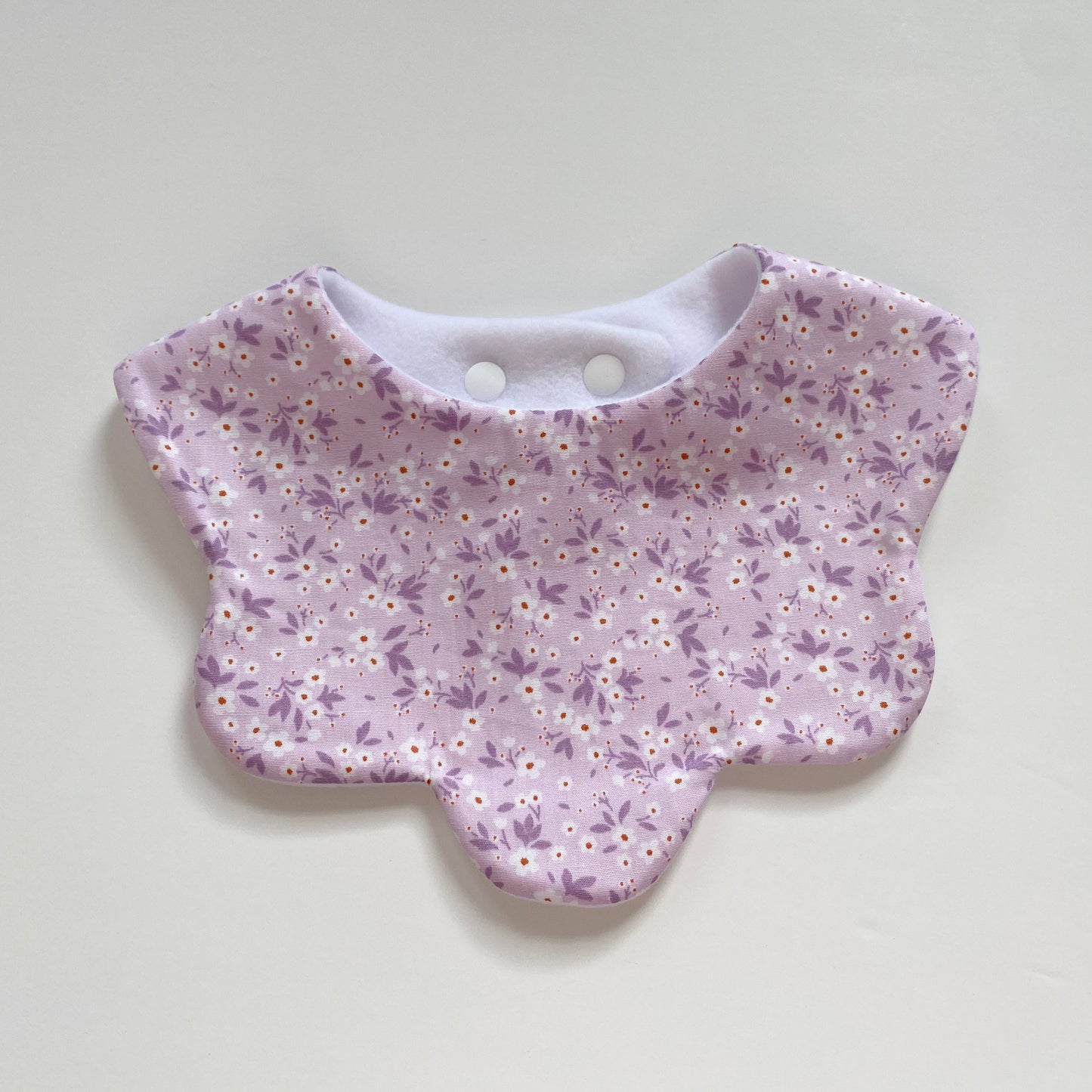 Choice of ditsy scallop bib