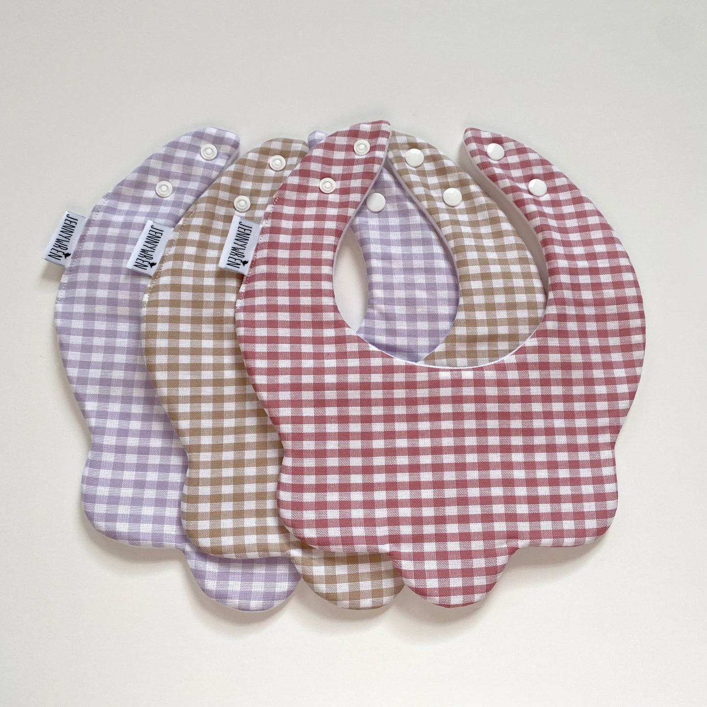 Choice of gingham scallop bib