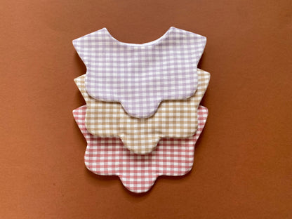 Choice of gingham scallop bib