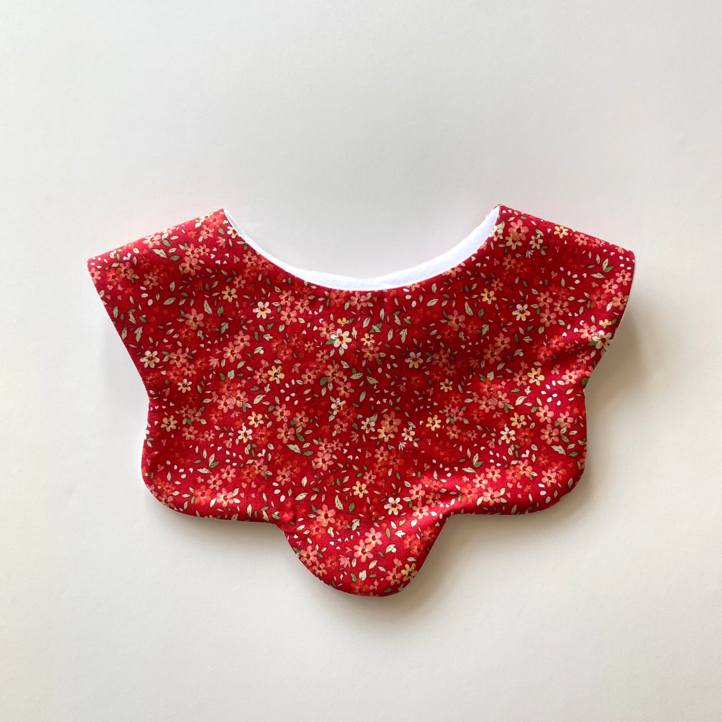 Red floral ditsy scallop bib