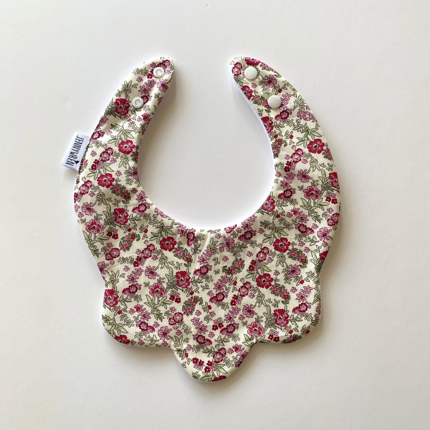 Cream red pink floral scallop bib