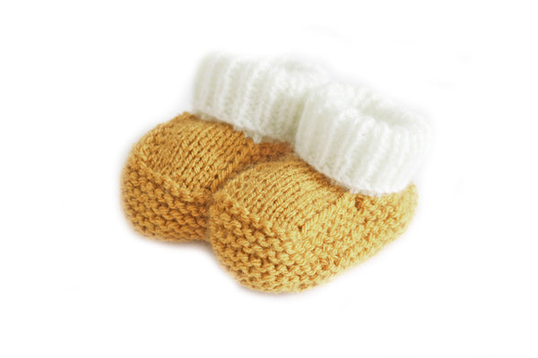 Knitted booties mustard