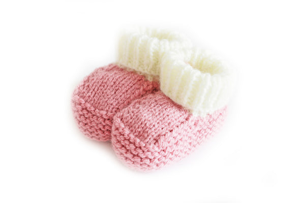 Knitted booties dusky pink