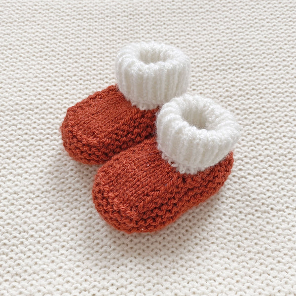 Knitted booties copper