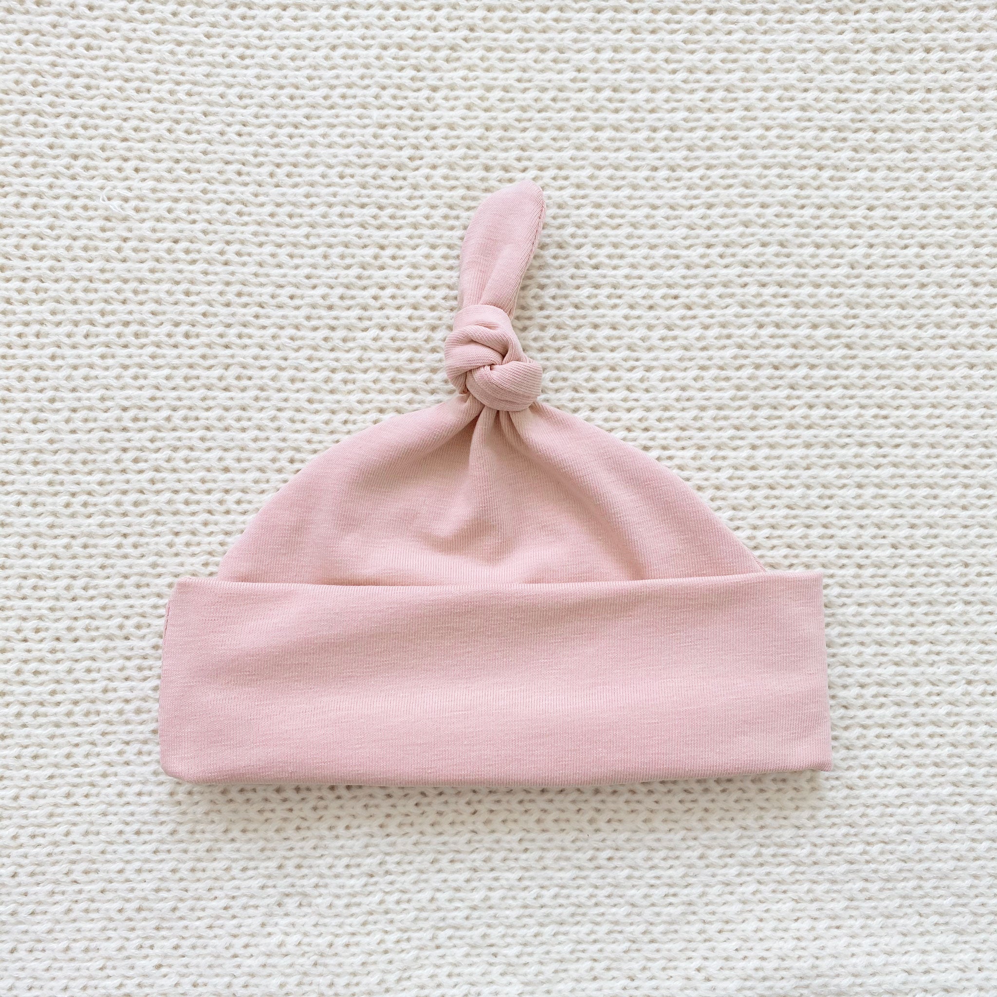 Dusky pink knot hat