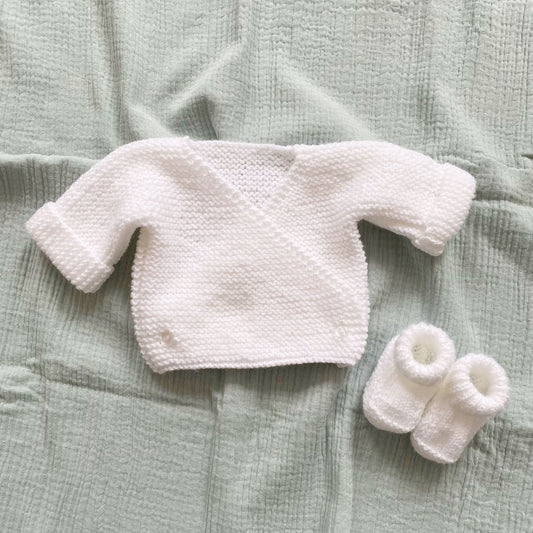 White knitted wrap baby cardigan and booties set